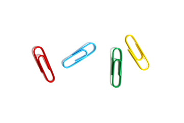 There are brightly colored paper clips on a white background.