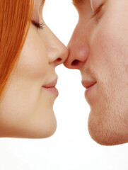 Close up of young couple touch nose