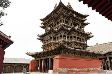 Obraz premium Asian Chinese historical tourist attractions, Feiyun Tower on a rainy day, a pure wooden tower pavilion ancient building. The word 