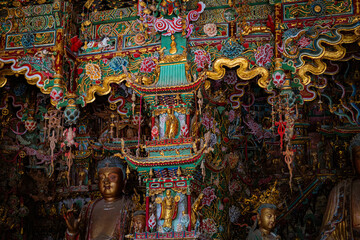 Stone statue of cross-legged Bodhisattva in Cave 18 of Yungang Grottoes, Datong, Shanxi Province