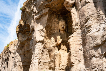 Stone statue of cross-legged Bodhisattva in Cave 17 of Yungang Grottoes, Datong, Shanxi Province