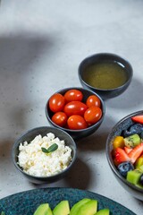 Preparing healthy lunch with fresh ingredients on kitchen table