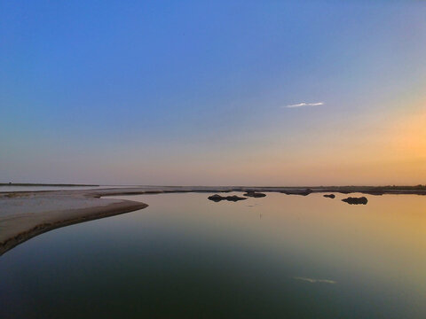 The Indus River. 
Pakistan's lifeline, harboring the ancient Indus Valley Civilization and nurturing diverse wildlife, flora, and vital migratory bird habitats along the Indus Flyway Zone.