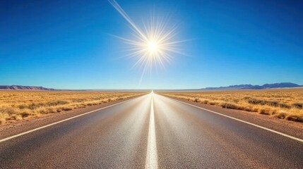 A long straight road through a desert landscape with the sun shining brightly in the sky.