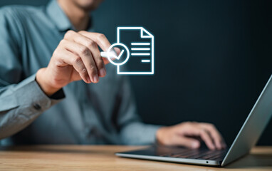 contract, information, document, search, text, employment, job, keyboard, management, marketing. A man is holding a piece of paper with a checkmark on it. Concept of approval or validation.