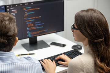 Team skilled developers program coding discussing creative website planning software project on two...