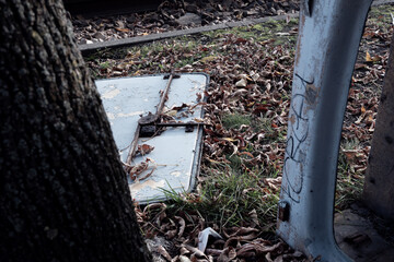 Destroyed metal doors lying on the ground