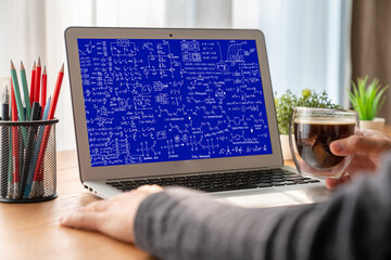 Mathematic equations and modish formula on computer screen showing concept of science and education