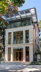 Obraz premium Modern townhouse with a glass roof and large windows, offering natural light.