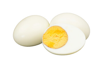 Two peeled hard chicken eggs and a half peeled one isolated transparent