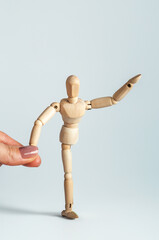 A person with a disability receives an outstretched hand to help