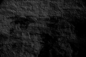 Dark black concrete wall background or texture	
