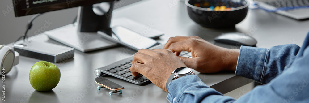 Poster website header shot of hands of african american male it engineer typing on keyboard, writing code i