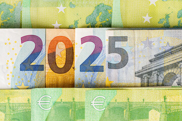2025 in the eurozone. Euro banknotes arranged in 2025, Concept, financial and economic analysis of...