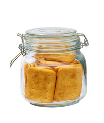 Cheese crackers in a clear glass jar, isolated on white background. Glass jar with cheese crackers.