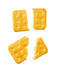 Broken cheese crackers isolated on white background, top view.