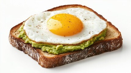 A slice of whole-grain toast with mashed avocado and a perfectly cooked fried egg, isolated on a white surface for a healthy morning meal concept.