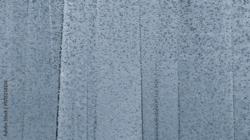 Poster a blue metal wall with a textured surface. the wall is covered in a pattern of lines and dots