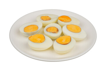 Slices of peeled boiled eggs on a white plate isolated transparent