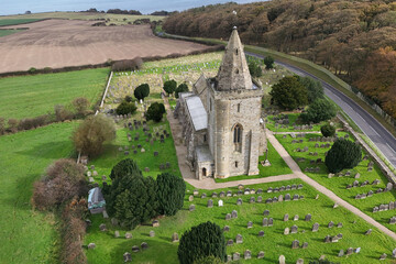 aerial view of Church of St Oswald, Lythe, is the parish church for the village of Lythe on the...