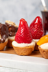 Fruit tartlet dessert on gray background
