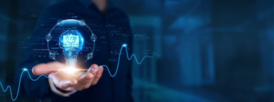 Software Development: Businessman hands with light bulb of inspiration bright idea and creative thinking energetic on digital network innovation, agility, collaboration, efficiency.