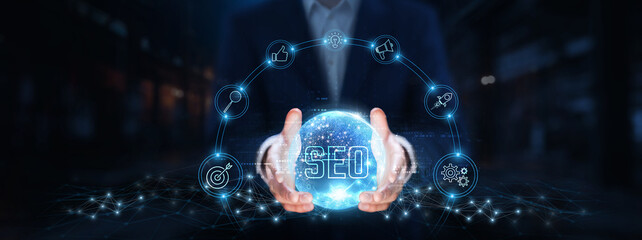 SEO: Businessman hands hold global SEO technology, optimization, analytics, keywords, ranking, traffic, conversion, visibility.