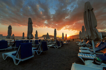 Sunset on the beach. Paradise beach. Tropical paradise, white sand, beach, palm trees and clear water