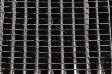 Close up of home air filter showing the dirt and particle cause bacteria inflection and sickness.