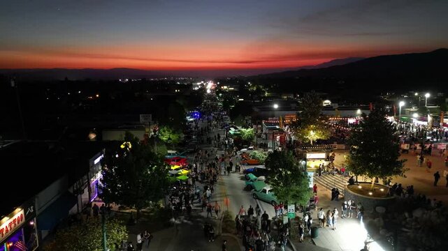Autumnfest in Yucaipa, California, the Classic Car Show as people enjoy the car show as seen from a drone 