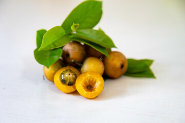 Ora-pro-nóbis Pereskia aculeata with ripe fruits and thorns on the surface