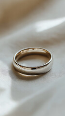 "Minimalistic Promise Ring on a White Background with Focused Camera Shot"