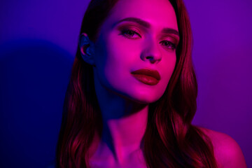 Photo of lovely gorgeous girl celebrity isolated on neon ultraviolet dark light background