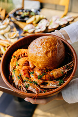 Grilled prawns served with freshly baked bread, perfect for restaurant menus, seafood lovers