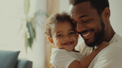 Obraz premium Father and son are sharing a tender moment, smiling and embracing in the comfort of their home. The love and bond between them is evident in their joyful expressions