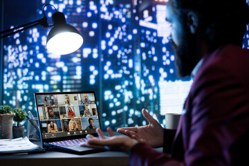 Obraz premium Chairman and staff discuss business plans on conference call, sharing ideas to expand company activity. Executive board members on videocall connection, affiliates interact beyond time differences.
