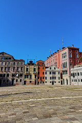 Old buildings before a very large square, Venice, Italy