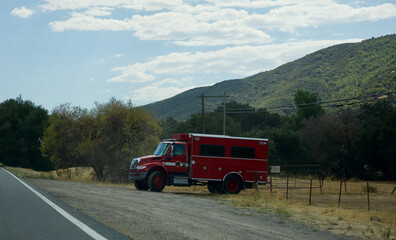 red fire truck transport vehicle responds to wildfires 