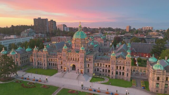 Victoria, British Columbia, Canada. September 24, 2024: The British Columbia Parliament Building in Victoria, BC, is illuminated at sunrise