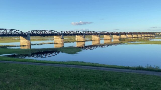 A long bridge reflected in the sky over a wide river, Langenfeld, D&ouml;mitzer Br&uuml;cken, World War II, Elbe, Wendland, Lower Saxony, Germany, Europe