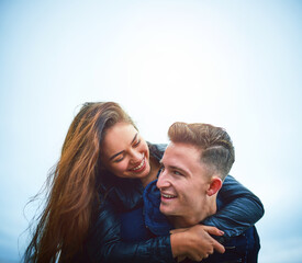 Couple, hug and outdoor with smile, love and piggy back on date with bonding and mockup. Happy, romance and gen z people together with travel and holiday in winter with support and care with fun