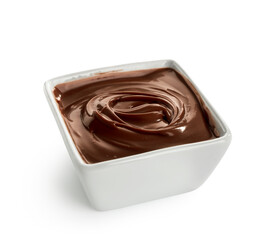 Bowl of sweet melted chocolate on white background