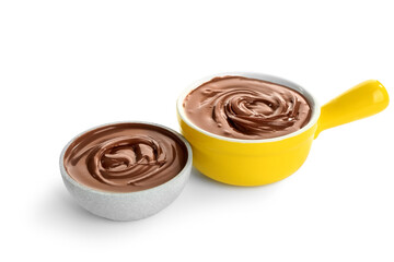 Bowls of tasty melted chocolate on white background