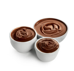 Bowls of tasty melted chocolate on white background
