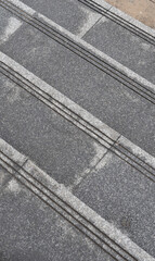 Fototapeta premium Wet and Dry Layers: Urban Staircase Surface After the Rain