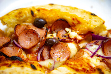 Rustic artisanal pepperoni pizza with red onion