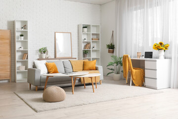 Interior on room with modern workplace and sunflowers in vase