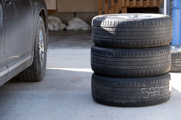 stack of Tires to be changed from winter tires