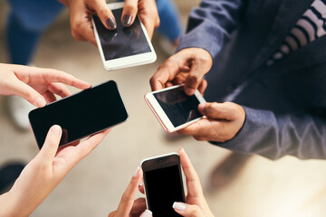 Office, above and hands of business people with phone for communication, contact us and networking. Professional, team and men and women in circle on smartphone for internet, website and social media