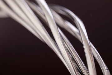 Close-up of metal wires in an abstract arrangement. Macro shot for design and print.
